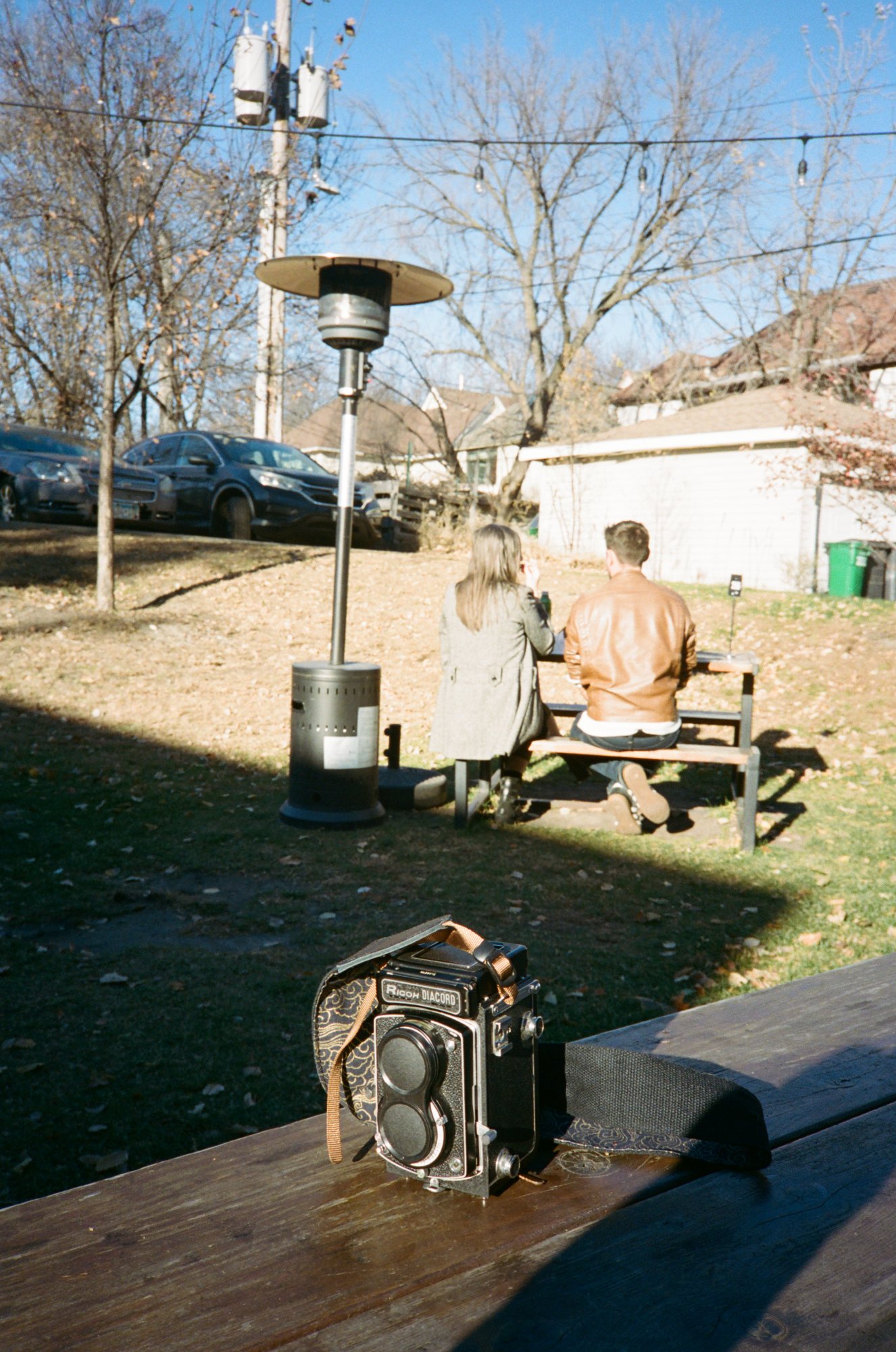 Twin-lens reflex camera on a picnic table